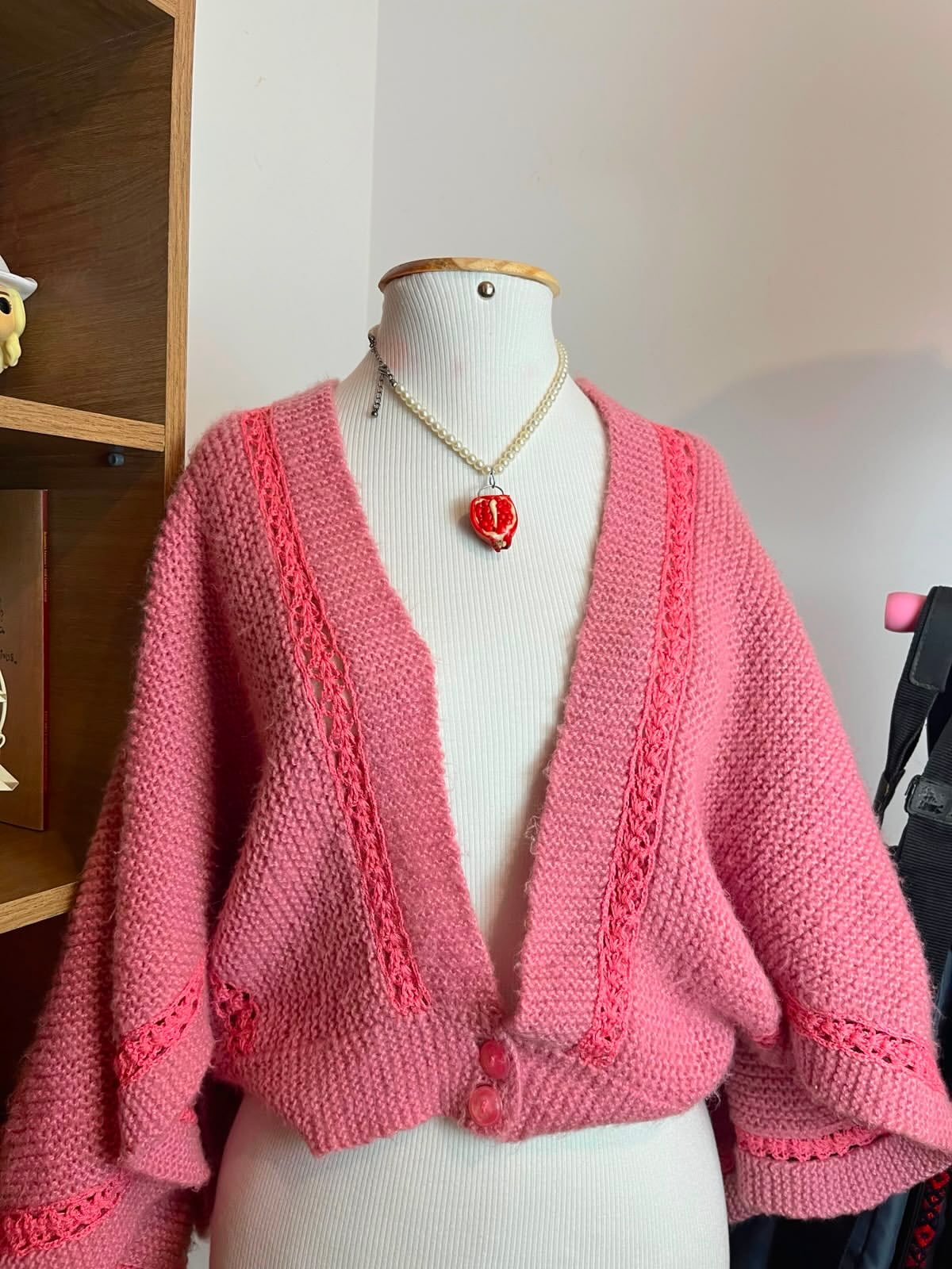 Poncho em malha rosa